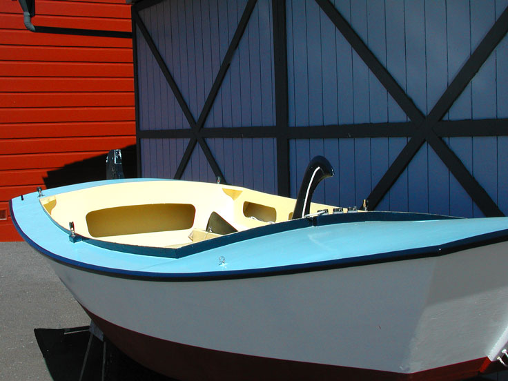 Calif-Boat-002-w.jpg - #0045_Primary Colors:  This boat picture with the red and blue garage doors behind it was photographed on the docks in San Francisco where the 'Tall Ships' anchored.  The colors of the doors are actual colors.