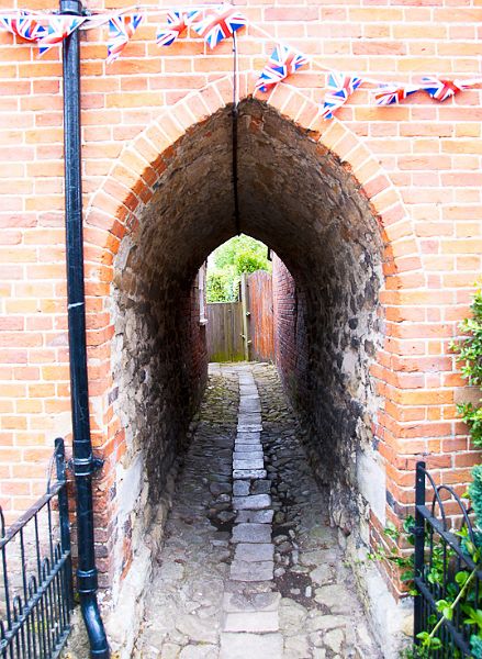 AlleyWay_DSC05780.jpg - #0138_Flag Covered Archway, Burley, New Forest, England