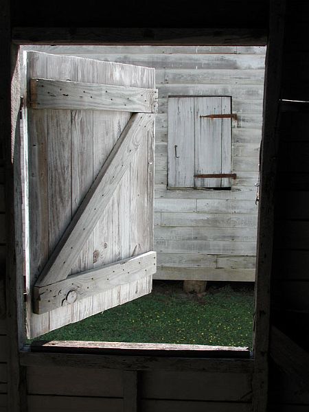 SlaveWindow-P3161119-w.jpg - #0095_Slave House Windows:  Slave quarters on a plantation near Natchez, Mississippi.