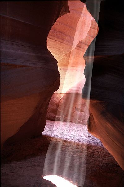 AntelopeCanyonLightAC-2-w.jpg - #0197_Antelope Canyon-2:  Antelope Canyon is a slot canyon near Page Arizonia carved by the winds and rain and is over 100 feet deep with a 1-2 foot opening at the top in most places.  Used my Canon T-90 35mm camera with 1-2 minute exposures.