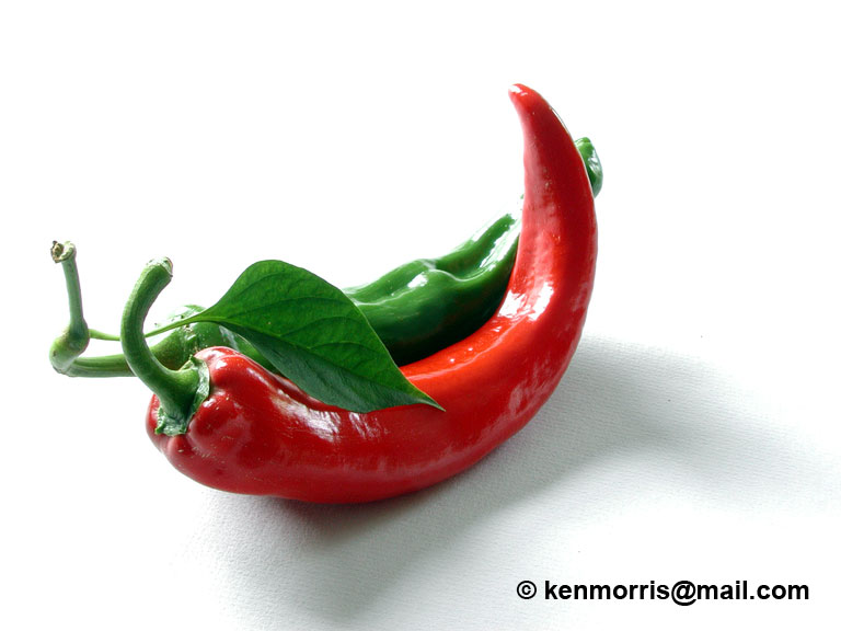 Pepper-2-web.jpg - #0271_Sensuous Peppers:  Peppers from our garden that called out to be photographed together.  A set of four small pictures in a 36 inch frame looks good on the kitchen wall.