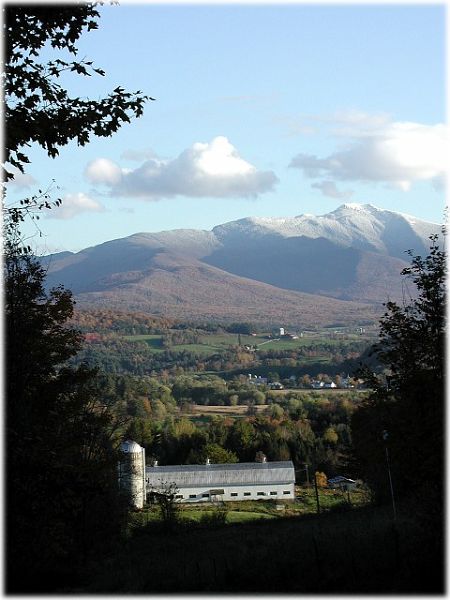 MtMansfield-Cambridge-2-w.JPG - #0028_The King Farm in Fletcher, Vermont, with Mount Mansfield and Cambridge Village in the background.